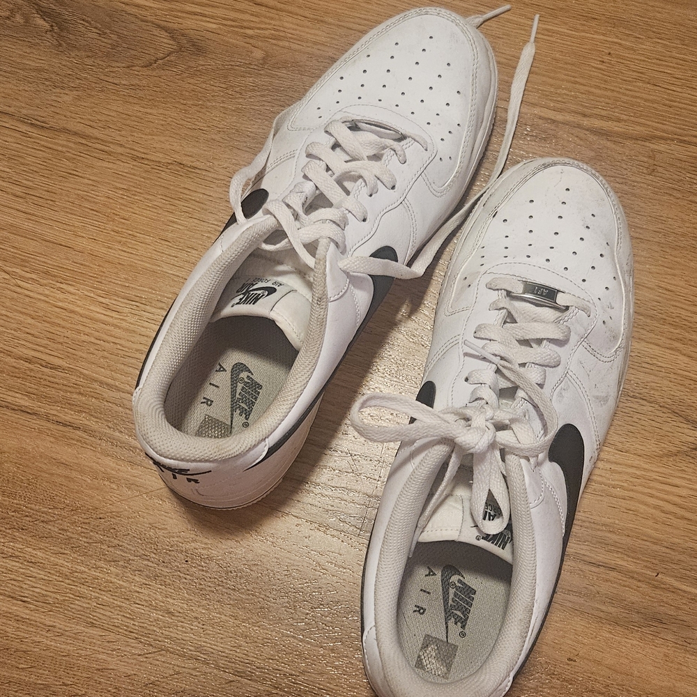 Nike Air Force 1 low-top sneakers in a white and black colorway